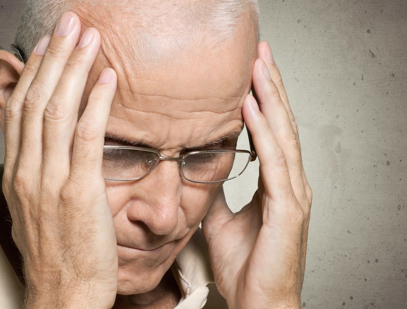 5232861457stroke_man_holding_head