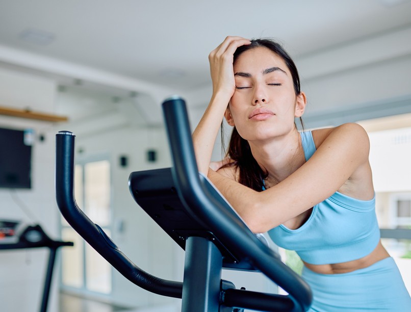 Young,Woman,Feeling,Tired,And,Fatigued,After,Intense,Training,Session