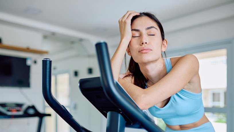 Young,Woman,Feeling,Tired,And,Fatigued,After,Intense,Training,Session
