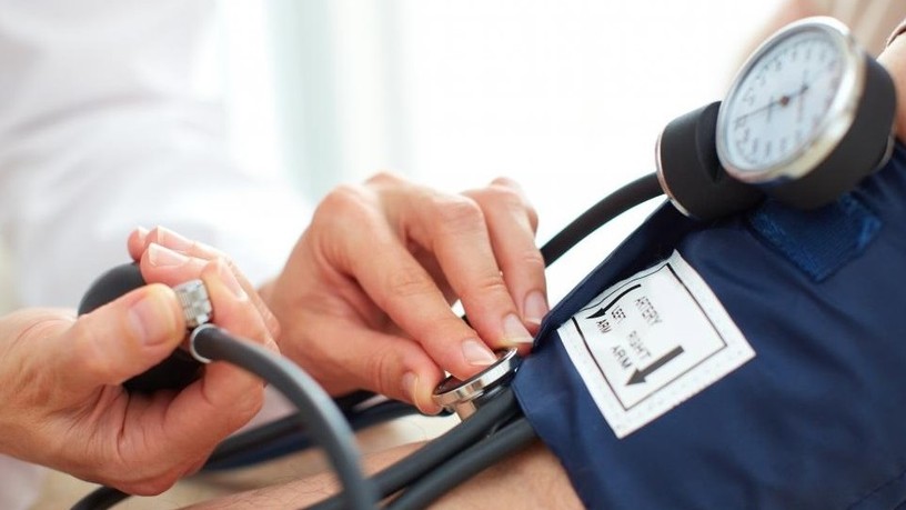 arm-with-blue-blood-pressure-cuff-and-women-hands_2